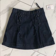 Free People Pleated Denim Skirt With Lace Up Detail Nwt Free People Pleated Jean Skirt, Denim Pleated Mini Skirt, Mini Denim Pleated Skirt, Jean Pleaded Mini Skirt, Blue Pleated Mini Denim Skirt, Denim Blue Pleated Mini Skirt, Pleated Denim Skirt, Free People Skirt, Jean Skirt