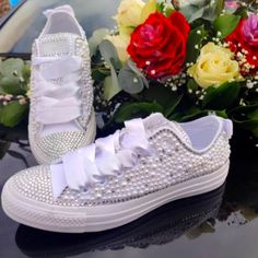 These White Converse Shoes Are Adorned With White Pearls And Clear Gem Stones. They Have White Ribbon Laces With Normal White Replacement Laces And Some Extra Gems Just In Case. Perfect To Wear For Your Wedding, Bridal Shower, Or Bachelorette Party Or Just To Be Fun And Fancy. Woman's Size 8.5, Fit True To Size. Smoke Free Home. Offers Welcome. White Party Sneakers With Rhinestones, White Rhinestone Party Sneakers, Elegant Embellished White Sneakers, Elegant White Embellished Sneakers, White Bedazzled Sneakers For Party, White Slip-on Party Sneakers, White Bedazzled Party Sneakers, White Embellished Sneakers For Party, White Slip-on Sneakers For Party