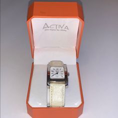 Activa Swiss Watch No. 495494 Water Resistant 30 M With/White Leather Band. New With Original Box Classic Adjustable White Watch Accessories, Classic White Adjustable Watch Accessories, White Watches With Diamond Hour Markers And Rectangular Dial, White Watch Accessories As A Gift, Casual White Analog Watches, Casual White Watches For Gifts, Casual White Watches As Gifts, White Analog Watch With Rectangular Dial, White Analog Watches With Rectangular Dial