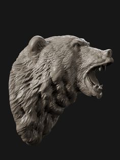 a statue of a grizzly bear with its mouth open and it's teeth wide open