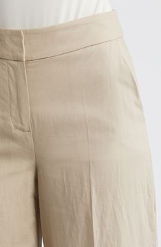 Clean lines and simple details offer a refined appearance in wide-leg linen-blend pants expertly tailored to elevate both in-office and off-duty looks. 31" inseam; 24 1/2" leg opening; 10 3/4" front rise; 15 3/4" back rise Zip fly with hook-and-bar closure Side-seam pockets 55% rayon, 45% linen Dry clean Imported Chic Flax Wide Leg Pants For Work, Flax Tapered Leg Pants For Work, Tapered Leg Flax Pants For Work, Tailored Linen Bottoms Modern Style, Modern Tailored Linen Bottoms, Linen Wide Leg Pants For Work With Straight Hem, Linen Wide Leg Pants For Work, Wide Leg Linen Pants For Workwear, Flax Color Wide Leg Workwear Bottoms