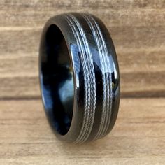 “The Angler” Black Tungsten Ring With Fishing Line ALT Wedding Band BW James Jewelers Men’s Wedding Bands Fishing, Mens Wedding Bands Fishing Line, Fishing Line Wedding Ring, Fishing Wedding Rings For Men, Fishing Line Wedding Band, Tungsten Metal, Wooden Wedding Bands, Ring Upgrade, Fishing Wedding