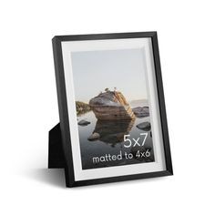 a black and white photo frame with the text 5x7 matted to 4x6