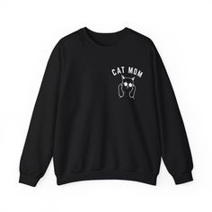 Cat Mom Sweatshirt, Funny Pet Lover Sweatshirt for Her, Cat Mama Sweatshirt for Mom Gift from Kids, Cat T-Sweatshirt Gift for Women 💫Ideal for any situation, a unisex heavy blend crewneck sweatshirt is pure comfort. 💫 Made with a medium-heavy fabric blend of 50% cotton and 50% polyester, this sweatshirt feels cozy and is the perfect choice for those colder months. 💫 Made using 100% ethically grown US cotton. Gildan is also a proud member of the US Cotton Trust Protocol ensuring ethical and su Winter Crew Neck Top With Cat Print, Trendy Long Sleeve Sweatshirt With Cat Design, Cat Design Cotton Long Sleeve Sweatshirt, Relaxed Fit Long Sleeve Sweatshirt With Cat Print, Black Long Sleeve Hoodie With Cat Design, Casual Black Hoodie With Cat Print, Relaxed Fit Cat Design Tops For Streetwear, Relaxed Fit Tops With Cat Design For Streetwear, Casual Crew Neck Sweatshirt With Cat Print