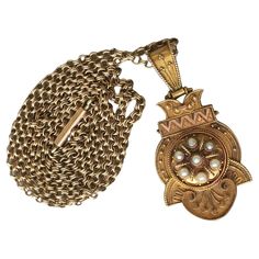 Rare Sample of Antique Etruscan revival circa 1850s Locket Pendent( 1 inch wide and 2 inch long), 25 inch original Victorian hand made chain, all tested close to 14k Yellow Gold & Rose Gold enhanced by Seed Pearls, Back Locket. Detailed Filigree enhanced Granulation work plus engraving American Made Victorian Pendant Necklace With Historical Design, Antique Yellow Gold Necklace With Historical Design, Antique Medallion Jewelry With Historical Design, Victorian Hallmarked Necklace For Ceremonial Events, Victorian Hallmarked Necklaces For Ceremonial Occasions, Victorian Hallmarked Necklaces For Ceremonial Events, Historical Yellow Gold Jewelry For Ceremonial Use, Historical Yellow Gold Jewelry For Ceremonies, Historical Yellow Gold Jewelry For Ceremonial Occasions