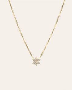 Adorn yourself with elegance in this stunning Star of David necklace, featuring genuine round-cut precious diamonds affixed to a delicate, 14K gold cable link chain. Made in L.A. Size of Star: Approx. 9mm Diamond Carat Weight: Approx. 0.13 ctw Total Weight: Approx. 2.5 grams Ships in 4-8 business days Rush order ships in 3-6 business days Comes gift ready in a beautiful custom jewelry box. *Eligible for return, per our policy. See here for details. Elegant Star Diamond Necklace With Diamond Accents, Elegant Star-shaped Necklace With Diamond Accents, Elegant Star-shaped Diamond Necklace With Accents, Elegant Star-shaped Diamond Necklace, Elegant Star Of David Necklace With Delicate Chain, Elegant Diamond Necklace With Star Of David Charm, Elegant Star Of David Diamond Necklace, Elegant Star-shaped Diamond Necklace For Gift, Elegant Star-shaped Diamond Necklace Gift