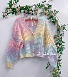 Pastel Rainbow Cropped Sweater Cardigan One Size Bust: 90cm Length: 39cm Sleeve: 57cm Cute Multicolor Long Sleeve Cardigan, Multicolor V-neck Cotton Cardigan, Multicolor Cotton V-neck Cardigan, Rainbow Long Sleeve Sweater For Spring, Long Sleeve Rainbow Sweater For Spring, Spring Rainbow Long Sleeve Sweater, Spring Multicolor Knitted Outerwear, Colorful Knitted Spring Cardigan, Casual Rainbow Cardigan For Winter