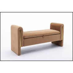 a beige bench with gold handles on it