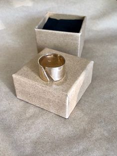 This wise silver adjustable ring is handcrafted from solid Sterling Silver. This wide ring is 1/2 inches wide with a gorgeous appeal that is trendy and fashionable. This solid ring band has a quality thickness and will last over time. This ring is aslo available in 14/20 Gold fill, which is a quality Gold fill that look just like 14k gold and will not change color. The ring comes with a smooth finish( as shown) or lightly textured finish (your choice). This ring is adjustable! Which is great for Minimalist Silver Wide Band Ring Gift, Silver Midi Rings With Thick Band For Gift, Silver Midi Rings With Thick Band As Gift, Silver Thick Band Midi Rings As Gift, Unique Wide Band Ring As Gift, Minimalist Wide Band Ring Stamped 925, Handmade Wide Band Ring For Gift, Handmade Wide Band Ring Gift, Minimalist Open Band Wide Ring For Gift