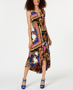 Dance the night away in this printed Thalia Sodi maxi dress, featuring a high-low flounce hem that flows with your every move. Crewneck; maxi silhouette Pullover style Keyhole neck with hardware trim; high-low flounce hem Polyester/spandex Machine washable Imported Keyhole Neck, Review Dresses, Matching Family Outfits, Romper Dress, Tropical Floral, Set Outfit, Dress Suits, Trendy Plus Size, Active Wear Tops