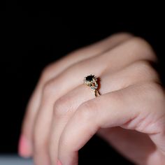 Product Details Radiant and sparkling, this stunning Created Black Diamond Ring serves as a dazzling symbol of the promise of eternal love and a happily ever after. Featuring a 4 MM Round Shape Created Black Diamond held in place by a Claw Setting, and adorned with Round and Marquise Diamond stones on a beautiful Flower Split Shank Ring, this Floral Promise Ring is a truly magnificent choice for everyday wear. With a total weight of 1.25 Carats and an AAAA Quality certification, this ring boasts Diamond Flower Ring, Split Shank Ring, Claw Setting, Black Diamond Ring, Ring With Diamond, Split Shank, The Promise, Marquise Diamond, Diamond Flower