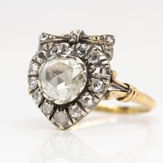 The Alexa ring is a piece of jewelry inspired in the Victorian period. This ring centers one original antique GIA Certified rose cut diamond of J color and VS1 clarity that weighs 0.93ctw. The center stone is surrounded by 26 rose cut diamonds of J color and SI1 clarity that weigh 0.64ctw. Total weight: 6.2 grams/ 4.0dwt Ring measurement: 18mm by 15mm by 8mm Ring size: 8 Historical Accessories, Doing The Right Thing, Rose Cut Diamond Ring, Victorian Engagement Rings, Rosecut Diamond Ring, Victorian Revival, Victorian Period, Ring Ideas, Rose Cut Diamond