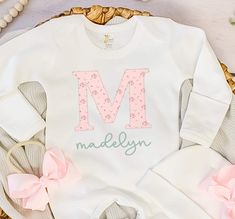 Introducing our adorable newborn coming home outfit - the perfect coming home outfit for your precious little one! This custom infant outfit features a beautiful, personalized baby romper, made with love and care to welcome your baby into the world. Our baby clothes are crafted from the softest fabrics and designed to ensure your baby's comfort. This makes a thoughtful and unique baby shower gift, newborn photography or a special addition to your little one's wardrobe. I take pride in creating o Pink Long Sleeve Baptism Sets, Pink Long Sleeve Sets For Baptism, Pink Cotton Baptism Onesie, Fitted Cotton Sets For First Birthday, Pink Cotton Onesie With Name Print, Cotton Onesie For Baptism, Fitted Pink Onesie With Name Print, Pink Fitted Onesie With Name Print, Spring Baptism Cotton Onesie