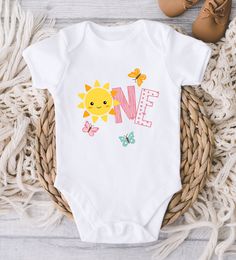 ** Quick Sizing Tip ** Baby ONESIES® Brand Bodysuits tend to run very small so we recommend sizing up for a better fit and to give baby longer wear time because they grow so fast. Toddler shirts are true to size. 📋 HOW TO ORDER: ✧ Choose Baby ONESIES® Brand Bodysuit or shirt size (sizing chart below) and sleeve length ✧ Select design color if applicable ✧ For personalized designs - enter customization in "Add your personalization" field ✧ ADD TO CART ✧ Select from our shipping class options (al Sunshine Birthday Party Decorations, First Birthday Sunshine, Sunshine Onesie, Sunshine Birthday Party, Butterfly 1st Birthday, Sunshine First Birthday, Baby First Birthday Themes, It's My Birthday Shirt, Sunshine Birthday Parties