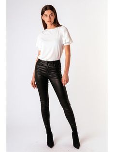 Tractr high rise skinny denim -black -Fabric content - 76% rayon 21% nylon 3% spandex -Measurements - 29" inseam / 10" rise / 8.5" leg opening Edgy Bottoms With Five Pockets For Fall, Edgy Straight Leg Jeans For Night Out, Chic Stretch High-rise Jeans, Sleek High Rise High Stretch Pants, Stretch Elastane Tapered Leg Jeans, Chic Full Length Bottoms For Elevated Casual Look, Sleek High Rise High Stretch Bottoms, Modern High Rise Fitted Pants, Chic Full Length Bottoms For Elevated Casual Occasion