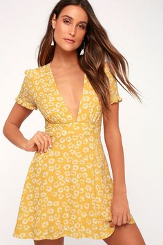 Garden Explorer Mustard Yellow Floral Print Mini Dress Knee-length Floral Print Sundress For Brunch, Floral Print Knee-length Sundress For Brunch, Spring V-neck Printed Sundress, Fitted Daisy Print Mini Dress For Spring, Fitted Mini Dress With Daisy Print For Spring, Yellow Floral Dress For Spring, Ditsy Floral Print V-neck Sundress, Yellow Mini Floral Dress For Spring, Fitted Daisy Print Summer Dresses