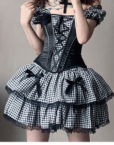 This price is for a corset and a skirt, others are not included.   	 		 			Size 			S 			M 			L 		 		 			Shoulder to Waist 			32 			33 			34 		 		 			Bust 			72-82 			74-84 			78-88 		 		 			Waist 			58-68 			62-72 			66-76 		 		 			Skirt Length 			42 			42 			42 Black Underbust Corset Dress For Summer, Fitted Corset Dress With Cancan For Costume Party, Fitted Corset With Attached Cancan, Vintage Corset Dress For Cosplay, Fitted Mini Length Coquette Corset, Gothic Underbust Corset For Summer, Summer Gothic Underbust Corset, Fitted Punk Skirt With Ruffles, Punk Style Fitted Skirt With Ruffles