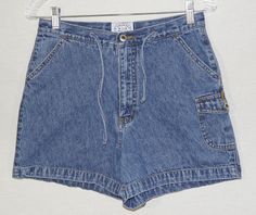 "Here's a great pair of blue cotton denim jean, quality tailored shorts by the high end Carolina Blues 1980's / 1990's vintage collector's label. You will love knocking about in these medium blue wash unique high waist, figure flattering, bare back, A line, high rise summer shorts! They are great for all outdoors activities and have a very original look and eye-catching appeal and a handy side pocket. Check out the photos and measurements and get this really great original 80s shorts! -- FLAT ME 80s Shorts, Vintage Jean Shorts, Outdoors Activities, Jean Vintage, Fashion Tops Blouse, Tailored Shorts, Short En Jean, Cute Shorts, Carolina Blue