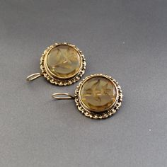 ✽ D E T A I L S   {Gemstone} - Yellow Glass   {Gemstone} - BRASS   {Gemstone Size} - 18 mm   {Earring Height Including Hoop} - 5.5 cm   {Earring Width} - 2.8 cm   {Finish} - Smooth and high polished with brilliant shine.   {Note} -The earrings are made to order, production day is about 3-5 working days. The one you receive may be slight different from the one                  in the picture due to handmade nature, but it will be almost same as in the above picture.    These pieces are handcrafte Victorian Drop Earrings For Pierced Ears, Antique Drop Earrings With Matching Jewelry, Vintage Jewelry With Ear Wire For Anniversary, Antique Jewelry With Matching Drop Earrings, Antique Pierced Round Jewelry, Victorian Style Clip-on Round Earrings, Vintage Pierced Round Earrings, Vintage Round Pierced Earrings, Antique Handmade Drop Clip-on Earrings