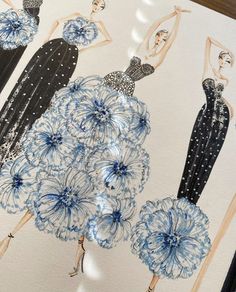 two women in evening gowns with blue flowers