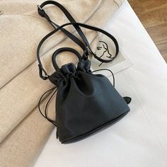 Casual Faux Leather Bucket Bag, Solid Color Soft Leather Bucket Bag, Soft Leather Bucket Bag, Kwik Sew, No Strings Attached, Drawstring Bucket Bag, Smooth Leather, Drawstring Backpack, Bucket Bag