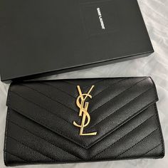 Got It As A Gift, Have Similar Item Brand New, Never Used Black With Gold Hardware 7.4x4.3x1.1 Inches 12 Card Slots, 1 Coin Pocket Authentic With Serial Number Elegant Black Pouch Wallet, Elegant Black Clutch With Card Slots, High-end Black Clutch With Dust Bag, Chic Black Clutch For Everyday Luxury, Chic Everyday Luxury Black Clutch, Luxury Black Pouch Wallet, Designer Black Envelope Clutch, Rectangular Black Clutch For Everyday Luxury, Everyday Luxury Black Rectangular Clutch