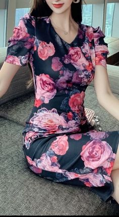 Classy dark floral midi dress for feminine women. Fit and modern design. This stunning semi formal dress will raise your elegance and make you noticed. Knee-length Floral Dress For Evening, Evening Floral Print Knee-length Bodycon Dress, Evening Knee-length Floral Bodycon Dress, Party Midi Dress With Floral Print And Short Sleeves, Elegant Midi Dress With Floral Print, Chic Floral Print Bodycon Evening Dress, Chic Floral Print Bodycon Dress For Evening, Black Feminine Knee-length Mini Dress, Elegant Floral Print Bodycon Dress For Date Night