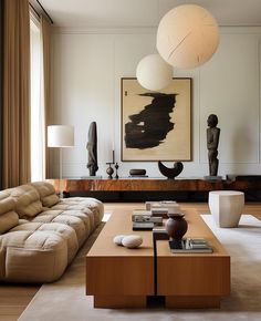 a living room filled with furniture and art