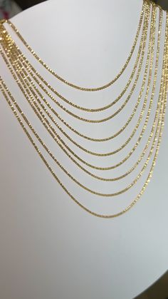 The perfect sparkling shine for your neck stack is here! Our Glimmer necklace will light up your neckline. Comes with a adjustable link chain perfect for all your layered looks.

Size: 1.20mm Wide
Solid 14K Gold
Lifetime Guarantee
Made in Los Angeles Neck Stack, Gold Piece, Children In Need, Necklace Sizes, Layered Look, Personalized Necklace, Link Chain, Light Up, Solid Gold