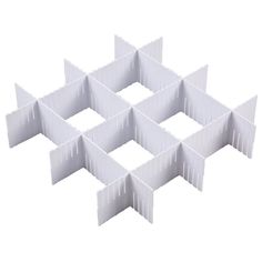 six pieces of white plastic are arranged in the shape of squares