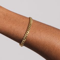 Give your outfit some extra life with our Cuban Link bracelet. This must-have bracelet can easily be worn anywhere with almost any yellow gold bracelet or watch. Plated in high-quality 18k gold, the versatile Cuban Link Bracelet is an impressive piece of jewelry that you will never want to take off. This product is guaranteed for life - GLD will repair the item should you experience any defects in craftsmanship or breakage. Specifications - Width: 5mm - Length: 6", 7", and 8" - Weight: (Weight c Cuban Link Bracelet, Miami Cuban Link, Miami Cuban, Yellow Gold Bracelet, Cuban Link, Delicate Bracelet, Link Bracelets, For Life, Lobster Clasp