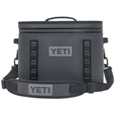 the yeti cooler bag is grey and has two straps on each side that are attached to it