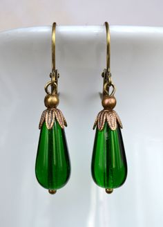 Vintage Green Brass Earrings, Festive Vintage Brass Earrings, Vintage Nickel-free Jewelry For Festive Occasion, Nickel-free Vintage Jewelry For Festive Occasions, Antique Teardrop Jewelry In Antique Gold, Antique Teardrop Brass Jewelry, Antique Brass Teardrop Jewelry, Vintage Green Brass Jewelry, Vintage Antique Gold Festive Jewelry