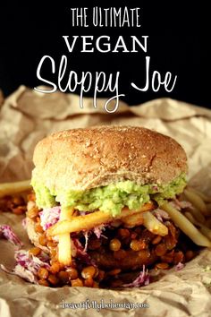 the ultimate vegan sloppy joe sandwich is loaded with beans, guacamole and lettuce