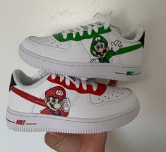 Mario and Luigi Super Mario Bros Custom Air Force shoes, painted with the highest quality shoe paint. The paint will not scratch or chip off easily. Please feel free to message me for any changes you want made to the shoes. To check out my other designs check out my IG: fortheart_LZ MESSAGE ME FOR DISCOUNT! Mario Painted Shoes, Sporty Hand Painted Custom Sneakers With Round Toe, Sporty Custom Hand-painted Sneakers With Round Toe, Sporty Hand-painted Custom Sneakers, Costom Shoes, Mario Shoes, Baby Jordan Shoes, Mario Und Luigi, Custom Sneakers Diy