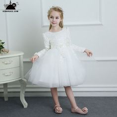 Winter Flower Girl Dresses White Spring Tutus Flower Girl Dress Tulle Long Sleeves For Winter Weddings #TG7037 at GemGrace. View more special Flower Girl Dresses now? #GemGrace To buy delicate gowns at affordable prices. Over 399 new styles added, shop now to get $5 off! Long Sleeve Tulle Pageant Dress For Wedding, Long Sleeve Tulle Princess Dress For First Communion, White Long Sleeve Princess Dress For First Communion, Fitted White Ball Gown For Dress-up, Fitted Tulle Wedding Dress For First Communion, White Fitted Ball Gown For Dress-up, White Long Sleeve Gown For Dress-up, White Long Sleeve Formal Gown, Long Sleeve Tulle First Communion Dress