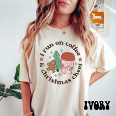 a woman wearing a t - shirt that says i run on coffee and christmas cheer