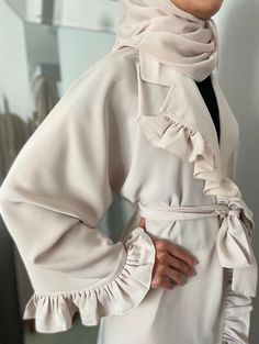 Beautiful trendy Abaya. Perfect for any occasion. 3 piece abaya set including hijab, belt and abaya gown. Made with superior quality fabric.  Made in U.A.E  (Please PM me for available sizes). Chic Long Abaya For Eid, Cream Long Abaya For Eid, Elegant Long Beige Abaya, Elegant Cream Long Sleeve Abaya, Elegant Long Sleeve Cream Abaya, Cream Abaya For Eid, Elegant Beige Abaya For Eid, Elegant Beige Long Thobe, Elegant Long Cream Abaya