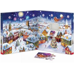 a christmas scene with santa's sleigh in the sky and snow covered town