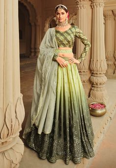 Green silk circular lehenga choli in Camo colour 2163  Desc:  Style : Circular Lehenga Choli Color : Camo Green Fabric : Silk Work : Embroidery   Sequence Wash Care : Dry clean Sleeve Style : Full Sleeve Long Sleeves : Done only in Custom Stitch Sleeves Lining : Done only in Custom Stitch Bust Size : 32 to 42 Inches Occasion : Wedding   Mehendi   Sangeet   Engagement   Reception   Ceremonial   Baby Shower   Teej. With Express Free Shipping and Custom Stitching, Buy Indian Party wedding wear brid Sequins Lehenga, Ghaghra Choli, Women Marriage, Pista Green, Lengha Choli, Green Lehenga, Saree Gown, Lehenga Choli Online, Lehenga Skirt