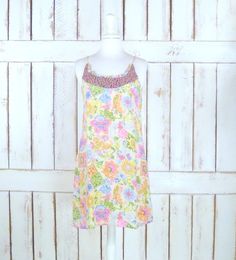 "90s vintage floral paisley mini slip dress/short floral tank dress/long tunic floral boho top Measurements... -estimated fit: ladies xsmall/small -marked size: xsmall -across bust: 16\" (40.6 cm) -across waist: 16 1/2\" (42 cm) -across hips: 19\" (48.2 cm) -length: 34\" (86.4 cm) Features... -pretty floral and paisley pattern in soft feminine colors -soft and lightweight rayon crepe...perfect for those hot days -darling ruffled detail with a mini floral accent -slip on style -perfect as a mini Slip Dress Short, Long Tunic Tops, Canyon Road, Mini Slip, Mini Slip Dress, Boho Top, Long Tunic, Floral Tank, Paisley Pattern