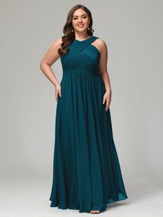 a woman in a long green dress