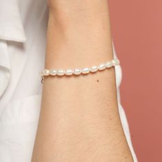 The Antonella Bracelet is a beautiful and timeless piece that exudes elegance and grace. This bracelet features a strand of lustrous freshwater pearls, each carefully selected for their unique shape and natural sheen. A delicate gold tag inscribed with the word "Love" adds a heartfelt touch. The adjustable clasp ensures a perfect fit, making it comfortable for all-day wear. Perfect for special occasions or adding a touch of sophistication to your everyday style, the Antonella Bracelet is a versatile and classic addition to any jewelry collection.  Details:   18k Gold Plated,length:19CM   FREE Insured Shipping (Worldwide) Gold Tag, The Word Love, Word Love, Everyday Style, Timeless Pieces, Everyday Fashion, Freshwater Pearls, Beaded Jewelry, Jewelry Collection