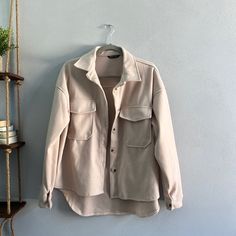 Never Worn And In Perfect Condition! 100% Polyester Cream Single-breasted Button-up Outerwear, Casual Button-up Blazer For Day Out, Oversized Button-up Blazer With Buttoned Pockets, Everyday Cream Collared Shacket, Oversized Cream Outerwear With Buttons, Trendy Beige Button-up Blazer, Trendy Everyday Button-up Outerwear, Chic Button-up Shacket With Pockets, Cream Collared Outerwear With Buttoned Pockets