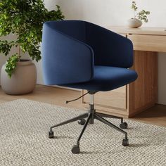 a blue office chair sitting on top of a rug