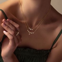 In a bustling world of ever-changing expectations, this Interlocking X's Diamond Pendant Necklace represents a bold yet timeless message of love. Shimmering diamond accents and detailed gold silhouettes combine to create the iconic Xs and Os, emblematic of the Ecksand maison. Accent diamonds: 0.90+ ctw, VS2+/F+ Pendant dimensions: 28x10 mm approx. Chain width: 1 mm approx. Chain length: 16 / 18 in. Chain type: Diamond-cut trace chain Closure: Lobster clasp Timeless Single Cut Diamond Jewelry For Everyday Luxury, Luxury Diamond Necklace With Accents For Anniversary, Timeless Luxury Diamond Pendant Necklace, Refined Yellow Gold Jewelry With Vs Clarity, Luxury Timeless Diamond Pendant Necklace, Everyday Luxury Diamond Necklace With Accents, Formal Diamond Necklace With Vs Clarity, Timeless Diamond Necklace With Single Cut Diamonds, Timeless Everyday Luxury Diamond Necklace With Single Cut Diamonds