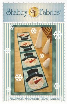 a table runner with snowmen on it