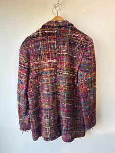 Vintage E. Rothenberg U.S.A. Hand Woven Multicolored Silk Jacket. A stunning piece with a symphony of colors and textures including some metallic threads woven together in a classic silhouette. Jacket has two large front pockets and a single black button closure. 100% hand woven silk, dry clean. Lined in what feels like black rayon. Marked size S but fits more like a M/L. In excellent vintage condition. Approx. measurements: Underarm to underarm: 20.5" Length: 30.5" Silk Jacket, Classic Silhouette, Metallic Thread, Black Button, Hand Woven, Hand Weaving, Dry Clean, Silk, Black