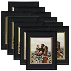 a set of six black and gold frames with an image of a man holding a baby