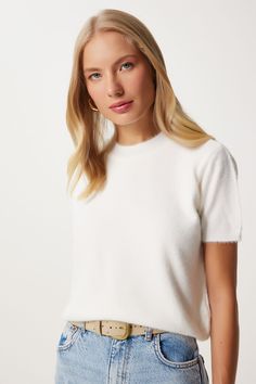 Experience ultimate comfort and elegance with our White Short Sleeve Cashmere Sweater. This luxurious knit top is crafted from the finest cashmere, providing a soft, cozy feel against your skin while keeping you stylish throughout the year. The timeless white color and classic crew neckline make it a versatile wardrobe staple that pairs effortlessly with jeans, skirts, or trousers. Whether worn alone or layered under a blazer, this sweater offers a polished look for any occasion, from casual outings to office meetings. Elevate your everyday style with this chic, comfortable piece. • White cashmere sweater • Short sleeve cashmere top • Women’s luxury knitwear • Soft cashmere sweater • White knit top for women • Elegant cashmere sweater • Women’s cozy knit top • Crew neck cashmere sweater • Luxury Soft Knit Cashmere Tops, Luxury Soft Knit Crew Neck Sweater, Luxury Knit Short Sleeve Tops, Luxury Soft Knit Elegant Tops, Luxury Casual Knitted Sweater, Luxury Casual Knit Sweater, Luxury White Knit Top, Luxury White Soft Knit Sweater, Luxury Elegant Knit Top